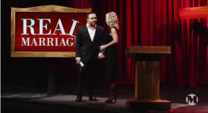 Mark Driscoll preaches in front of his book logo.